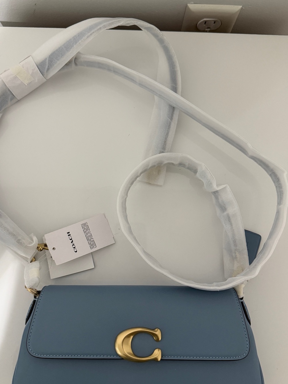Coach Blue Leather Crossbody with Gold 'C' Accent